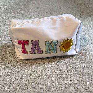 Amazon Tan Cosmetic Bag with Colorful Letters